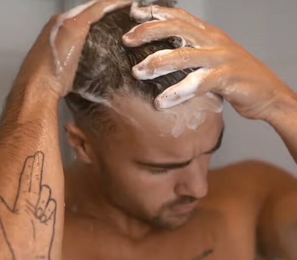 Hair loss medication available online from Urban TRT UK Man in shower - Hair loss medication available online from Urban TRT UK
